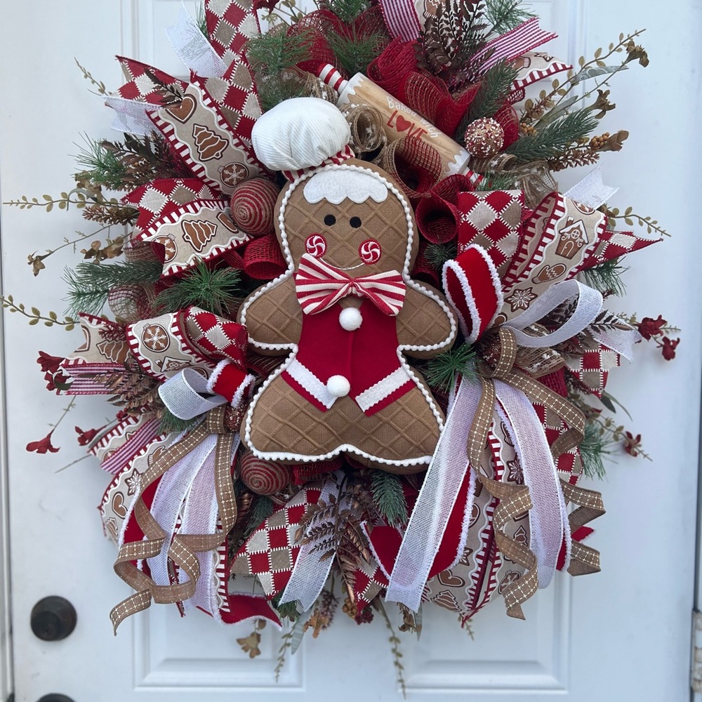Adorable Red and White Gingerbread Holiday Wreath. Aprox 26” wide